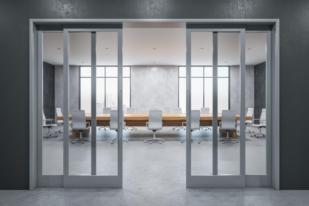 Frosted glass partition section for office privacy with bright lighting